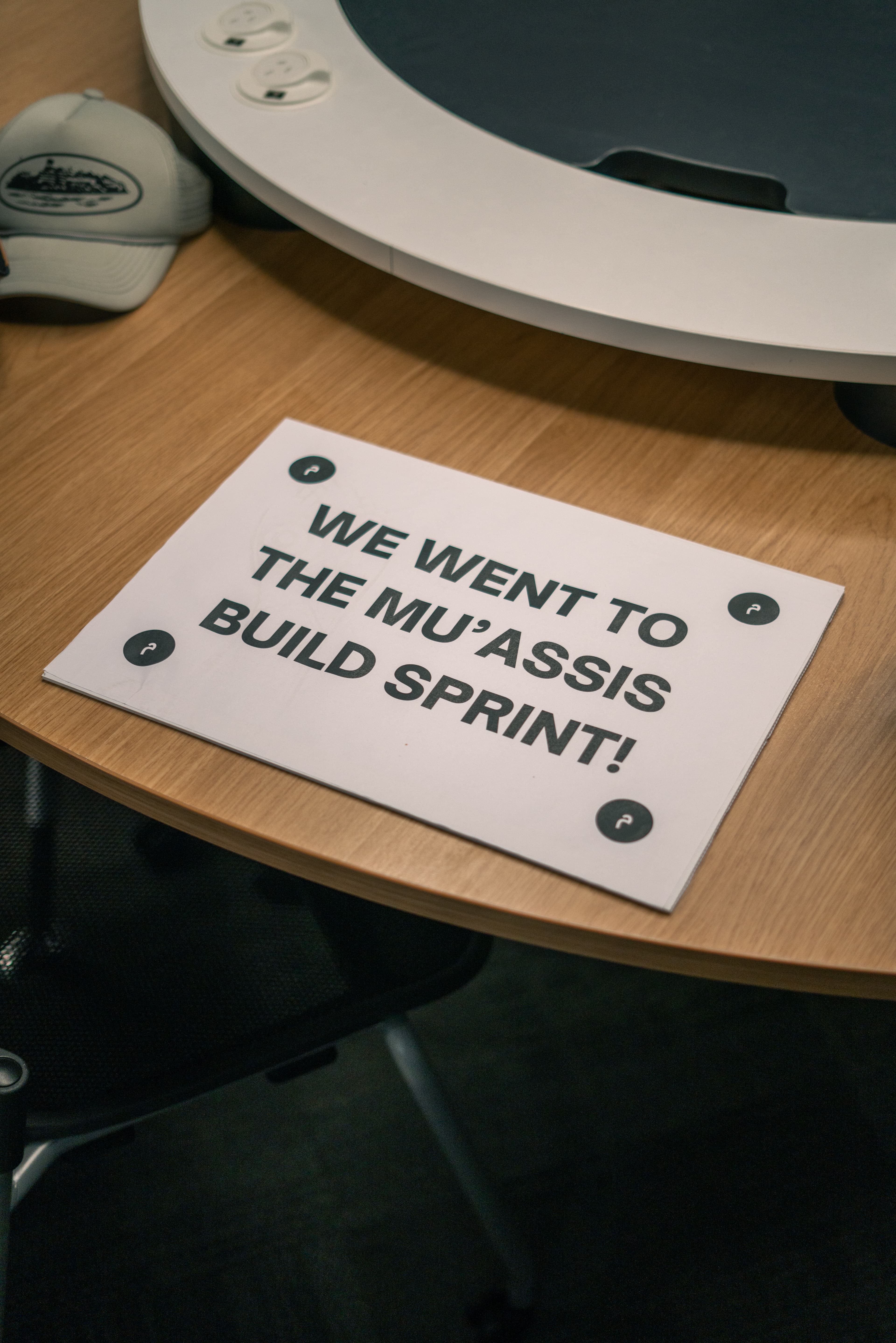 Focused planning moment with notes and devices.