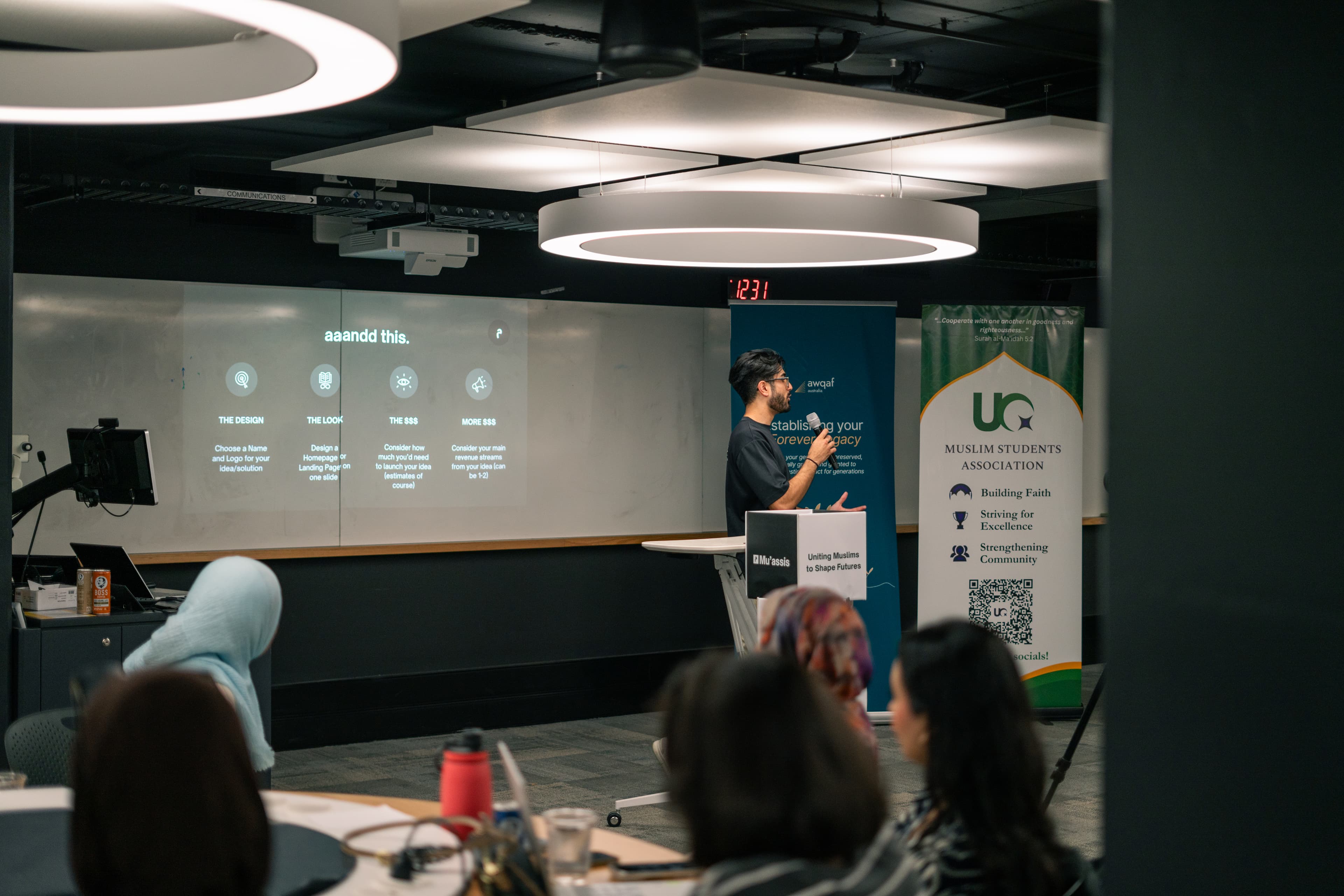 Creative workspace with team members in motion.