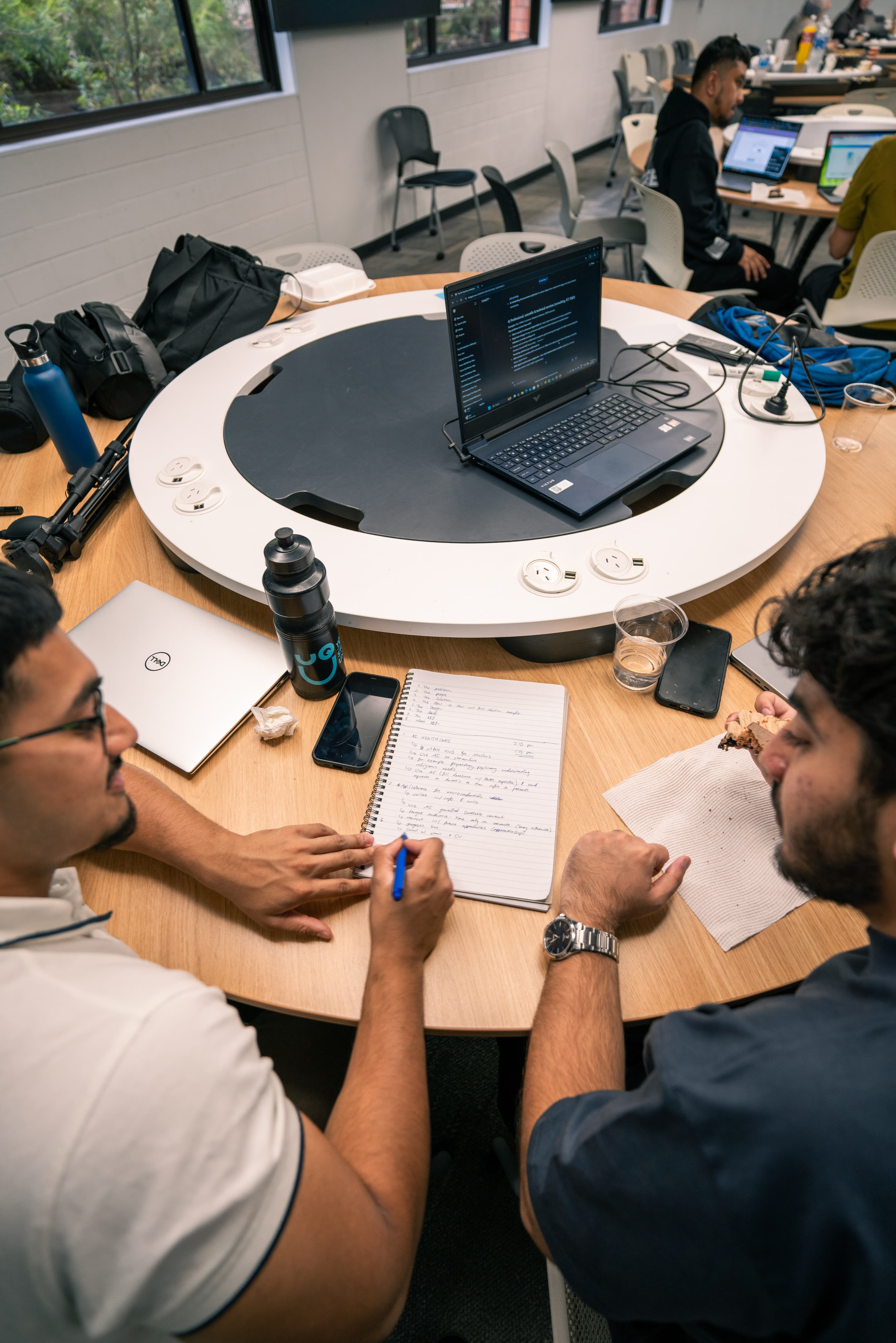 Focused founder conversation in a workshop.